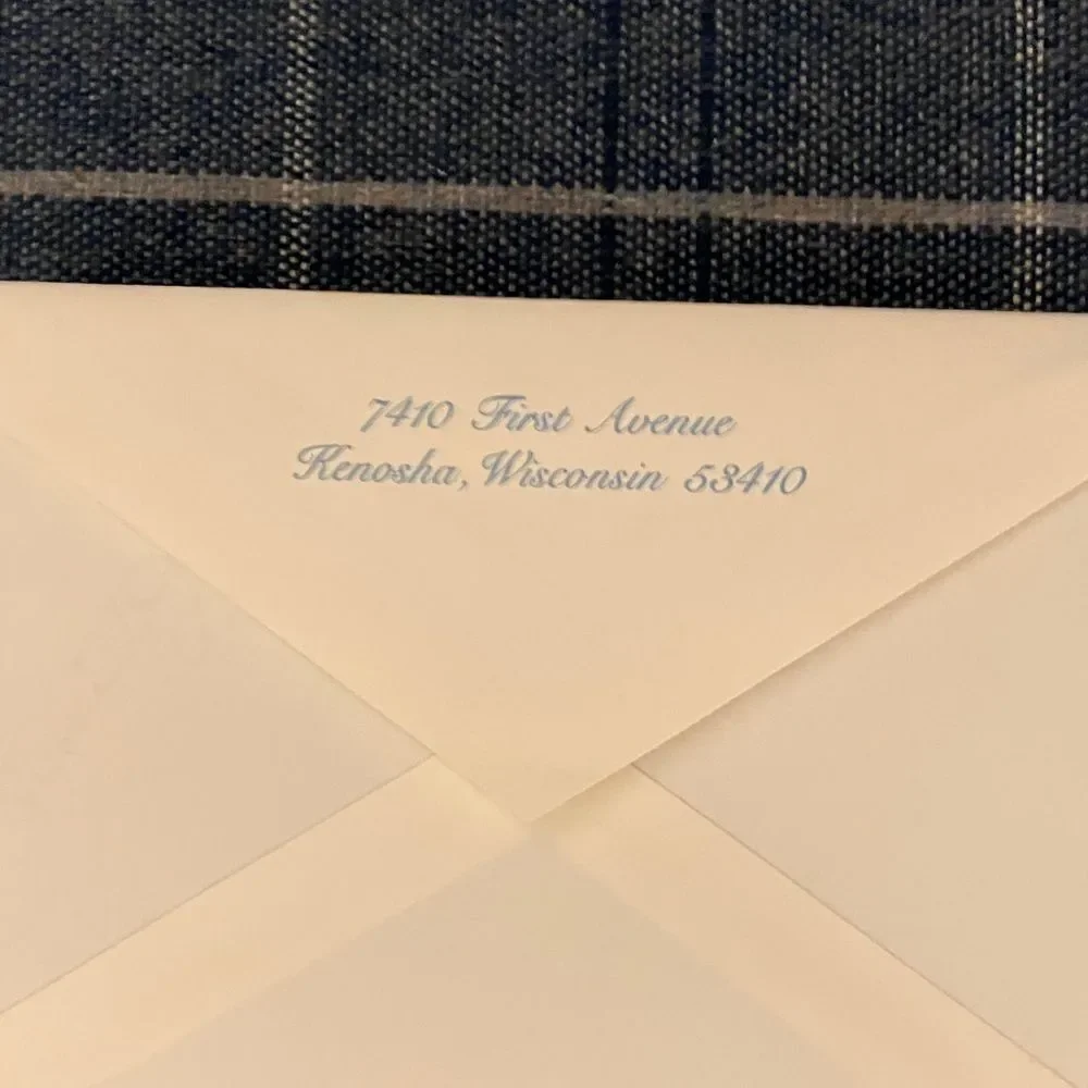 8 White and Blue Envelopes